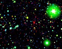 Spitzer Sees Back 9 Billion Years