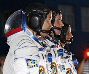 Joyful crews unite aboard space station
