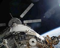 Space cargo ship set for docking with ISS
