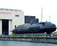 BAE profits fall, counts on government defence spend