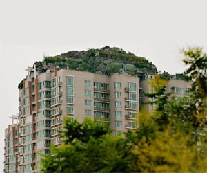 Beijing man builds rock villa on top of apartment tower