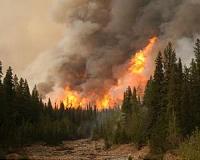 Canadian wildfire flareups force more oil region evacuations