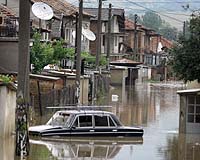 Eastern, Central Europe Mop Up After Floods, Portugal Burns Again