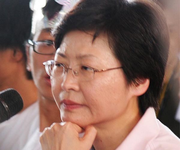 Hong Kong leader postpones policy speech after Beijing summons