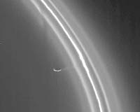 Cassini Captures Saturn Moon Red-Handed
