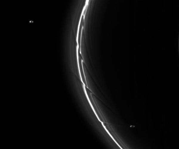 Small Satellite May Shape Centaur Rings