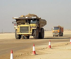 Caterpillar profit drops as it braces for slowdown