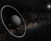 Cosmic collision creates mini-planet with rings