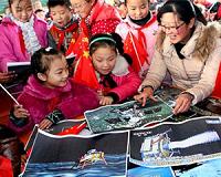 Diplomacy is child's play for China's underage welcome party