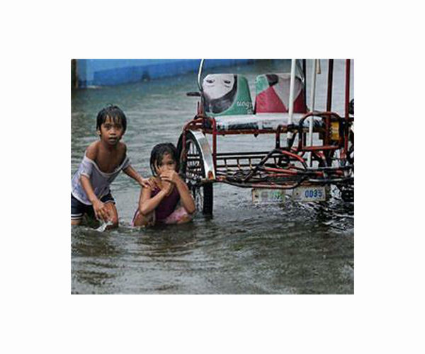 Tropical storm batters Philippines capital before exit