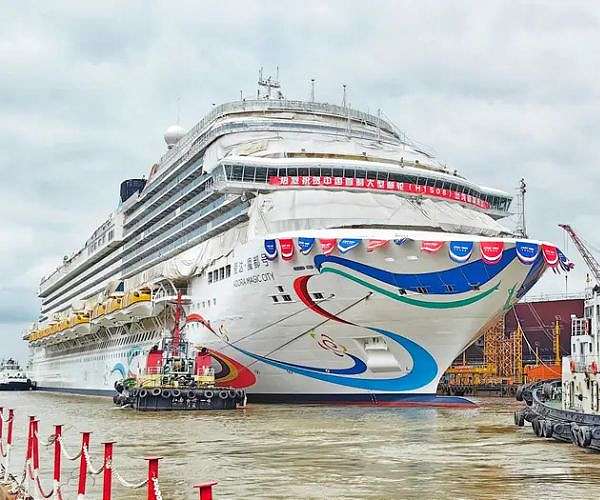 China's first domestically built cruise ship begins maiden voyage
