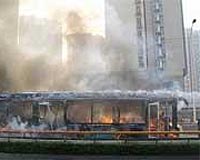 China bus fire kills 25, dozens injured: state media