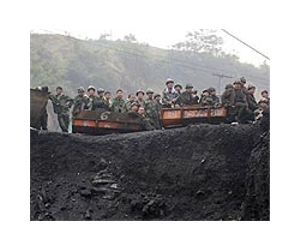 One dead, dozens trapped in flooded China coal mine