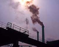 Australia delays emissions trading, extends help to polluters