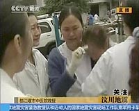 Thousands await relatives in stadium in China's earthquake zone