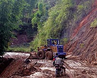 Death toll in southwest China rain rises to 43: state media
