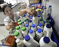 China has arrested 60 over tainted milk scandal: police