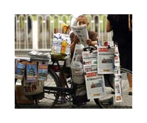 Propaganda authorities take over Beijing papers