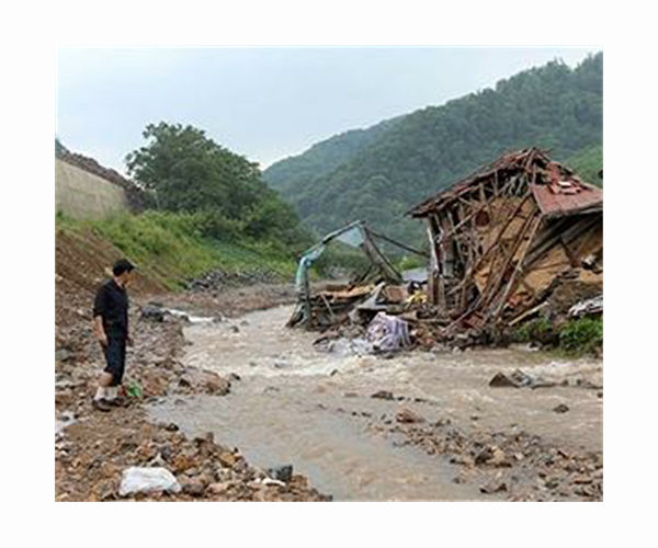 'Once in a hundred years': villagers clean up after deadly China floods