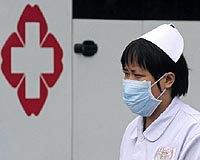 China confirms first mainland case of swine flu