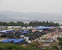 Aftershocks threaten swollen China 'quake lake'
