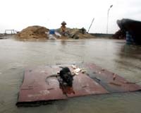 Deadly storm Krosa weakens, but still lashes China