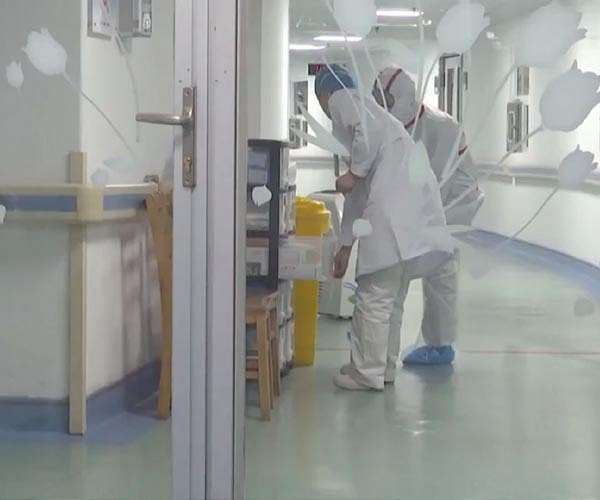 Caring with Covid: Infected doctors battle China virus surge
