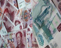 Putin says Russia and China to reduce use of dollar in trade