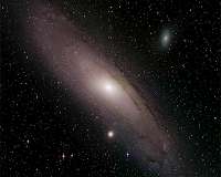 Two ancient migration events in the Andromeda Galaxy
