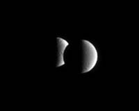 Dione Takes A Bite Out Of Tethys