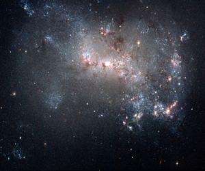 New images capture 'stealth merger' of dwarf galaxies