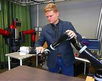 Helping hands guide robots as they learn