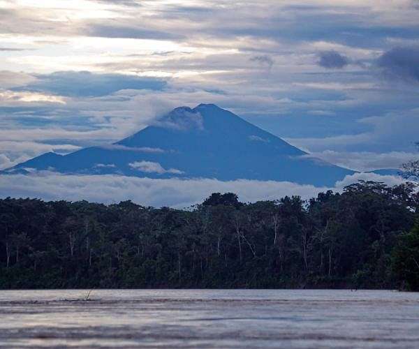 Ecuador volcano rumbles, spews ash cloud