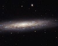 Hubble Catches a Dusty Spiral in Virgo