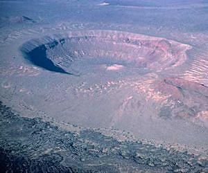 How does a volcanic crater grow? Grab some TNT and find out