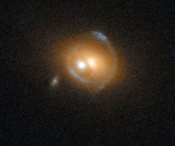 Quasar X ray link to black hole environment found to evolve over cosmic time