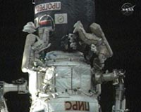 Station Spacewalkers Install Experiments And Probe