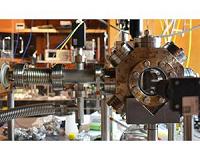 Using atoms to turn optical nanofiber guided light on and off