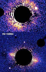 Two New Dusty Planetary Disks May Be Astrophysical Mirrors Of Our Kuiper Belt