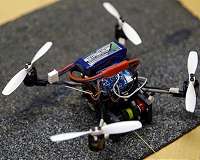 Small flying robots haul heavy loads
