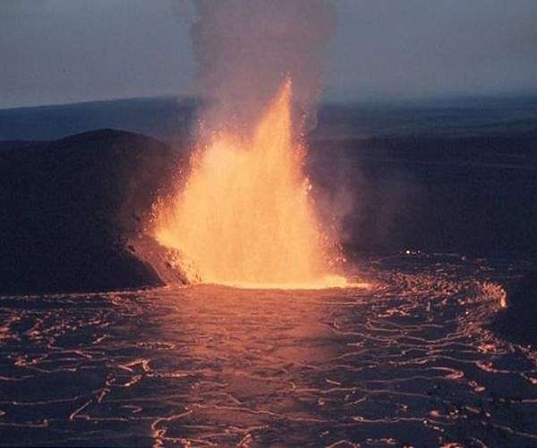 Canaries volcano razes hundreds of buildings as lava creeps to sea