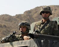 French lawmakers vote to keep troops in Afghanistan
