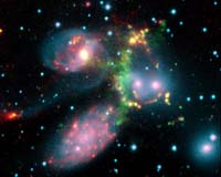 Spitzer Spies Intergalactic Sonic Boom