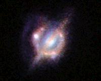 Best View Yet of Merging Galaxies in Distant Universe
