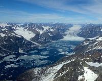 In Greenland village, shorter winters cast doubts over dog sledding