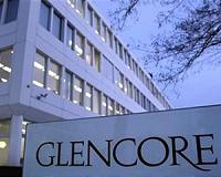 Glencore vows to cap coal output as profits tumble