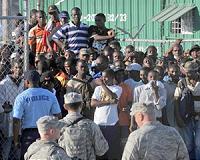 Stubborn, playful or hungry, Haitians defy Hurricane Matthew