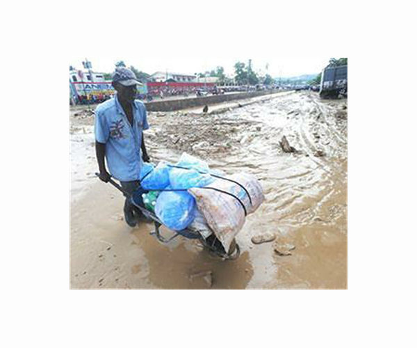 At least 21 dead in torrential Dominican Republic rains