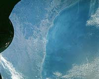 Gulf Bay Double Whammy: Rising Seas, Dammed Rivers