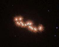 Hubble applauds waltzing dwarfs